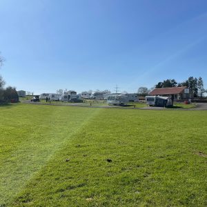 grass and caravans at Broadbeck Holiday Park